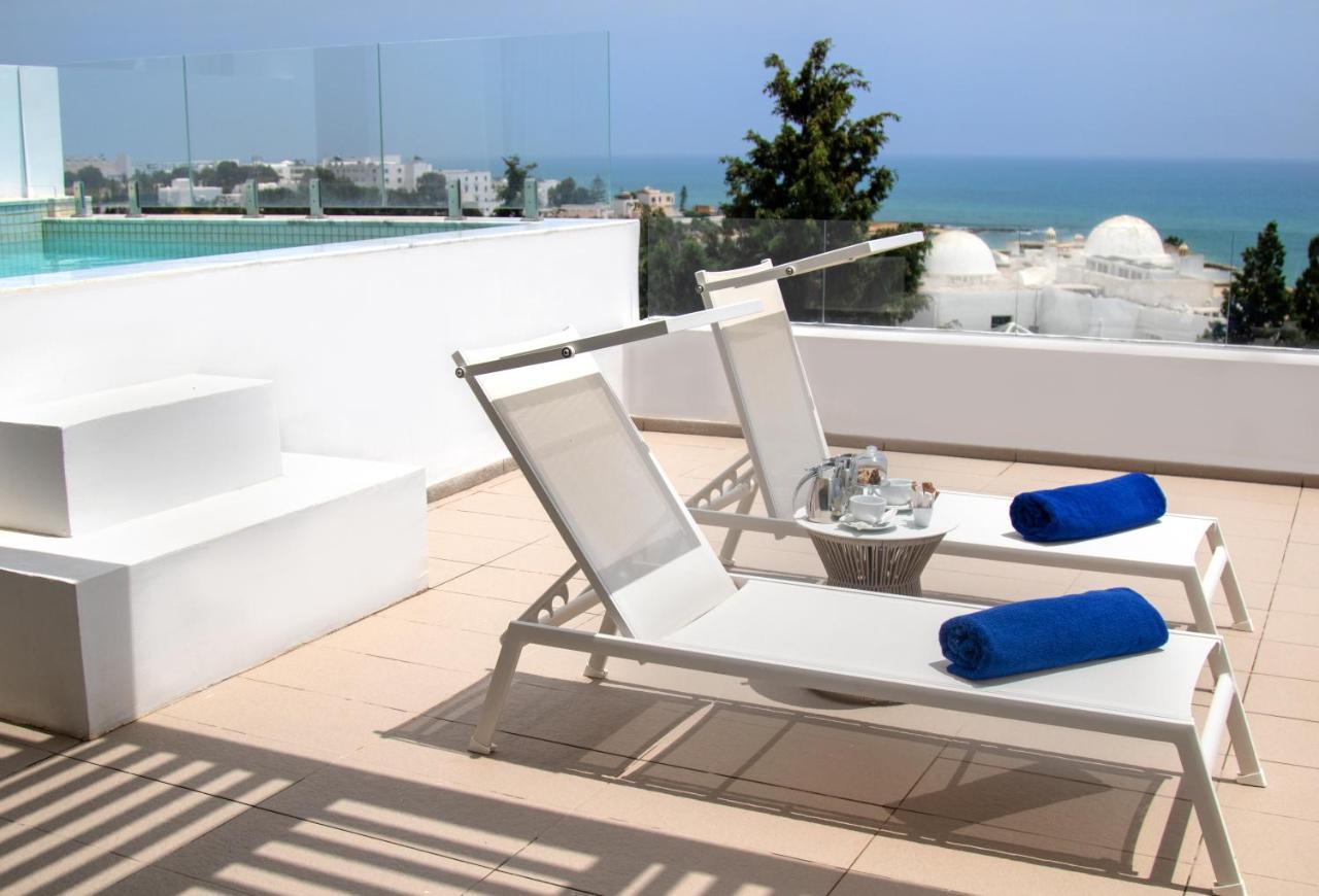 Royal Azur Thalassa Hammamet Exterior foto Rooftop pool at the hotel